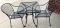 Rod iron table with two chairs
