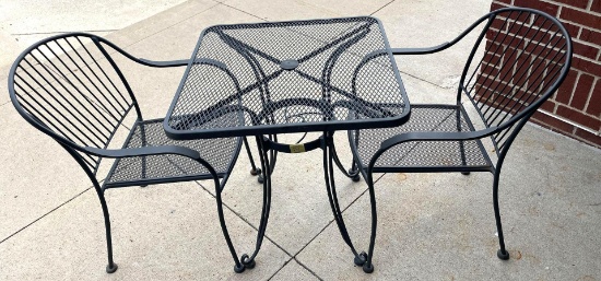 Rod iron table with two chairs