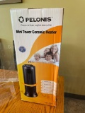 Oscillating mini tower ceramic heater