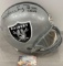 Howie Long autographed full size football Helmet with World Wide Authentication COA