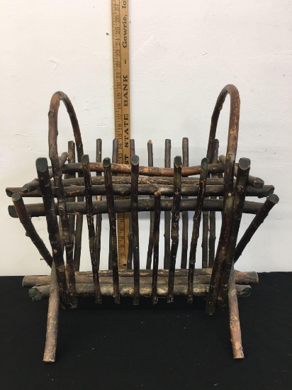 Antique magazine holder made of branches
