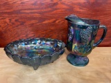 Carnival glass pitcher and footed bowl