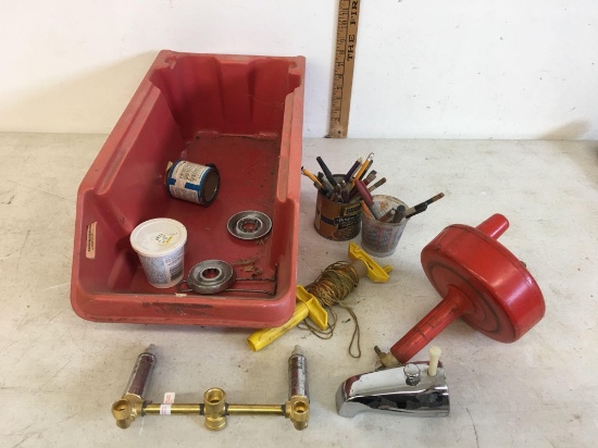 box with plumbing supplies