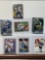 Football cards including Troy Aikman, Devin Singletary Silver and Mosaic Aaron Rodgers Silver