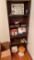 shelf contents. Iowa puzzle, Walkman, Discman, old Bibles, miscellaneous vintage