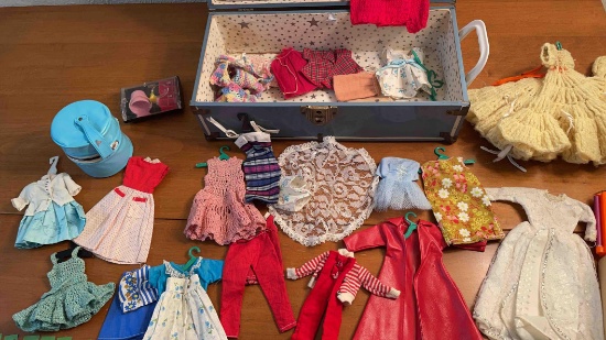 toy trunk full of Barbie/doll clothes