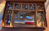 box of cufflinks pocket knives and more