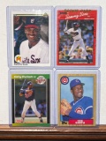 Lot of 4 cards including Sosa Rookies, Kirby Puckett, and Lee Smith