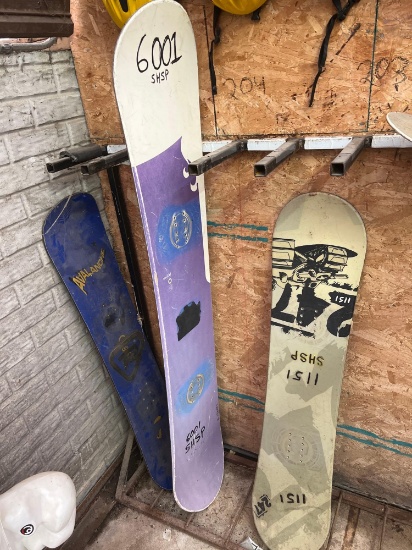 snowboards and snowboard racking with black light