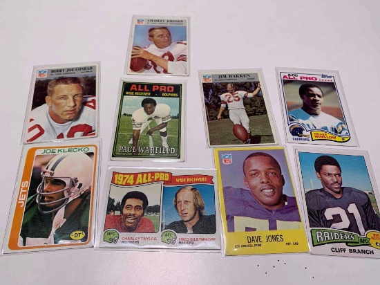 assorted football cards, Johnson, Warfield, Winslow, branch, Jones, Taylor, Conrad, Klecko