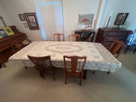 antique dropleaf table with non-matching chairs