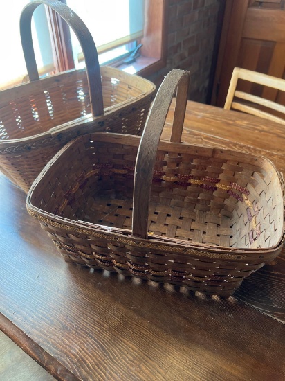 (2) primitive wicker baskets