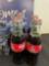 four pack of Coca-Cola, and sign basket and more
