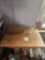 Small square wooden table with wooden box