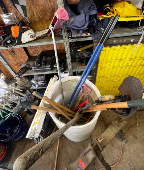 50 Gallon drum of hard tools post hole digger plus