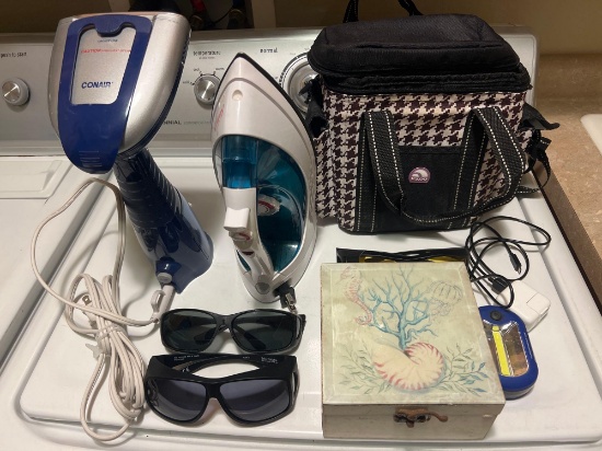Iron, Steamer, sun glasses, box, cooler and light.