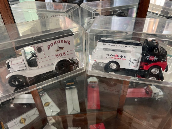 2 model coin trucks including Bordens and Kendall Motors