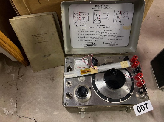 vintage Strainsert Company Strain Indicator Model HW-1, used for measuring strain in materials, with