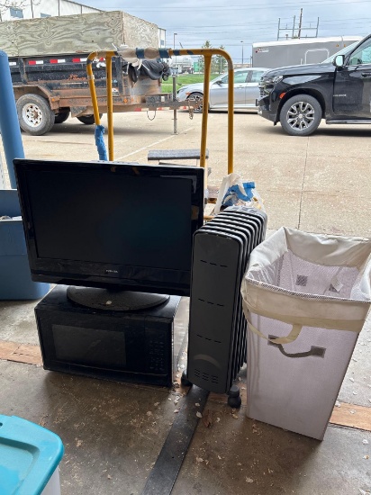 TV, television, heater, and laundry basket