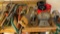 Miscellaneous tools, hitch, bench grinder, and more on top of bench