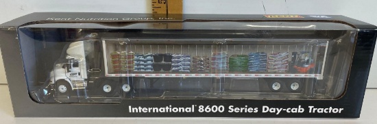 Kent nutrition international 8600 series day-cab tractor with a 53-ft smooth side trailer