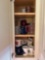 Cabinet's full of mugs, plates and glasses