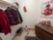 Closet off laundry room- mens clothes/shoes size xl/13 Hat on hat stand