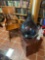 Rocking chair, puzzles, terrarium, and small drawers
