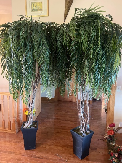 2 faux trees about 7.5 feet tall