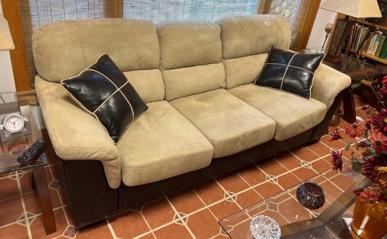 Couch- located in basement with walk out