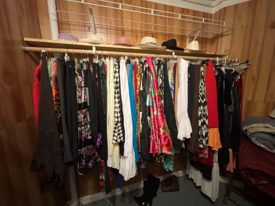 Large room full of clothes seemingly all womens