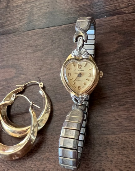 Hoop earring and Le Marque Watch marked