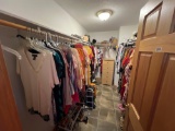 Contents of womens master bedroom closet