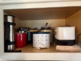 Cabinet with miscellaneous crockpots