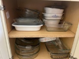 Cabinet full of baking dishes and pans