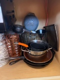 Cabinet with pans and pots