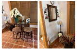 Circular bar table with 4 stools and decor
