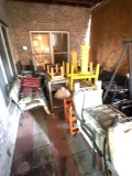 Patio full of lawn furniture and cast-iron and more!