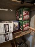 Basement storage closet with Christmas decor, some dishes and more