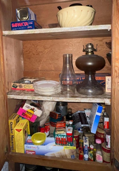 Cupboard of vintage spices. Oil lamp and Moore.
