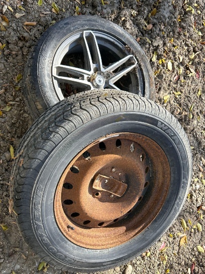 2 tires and rims appear to be new tread.