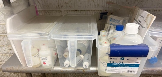 miscellaneous acid solutions and test tubes