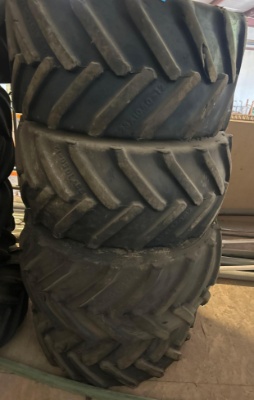 4- Tru Power 23x10.50-12 NHS Tires on Red Wheels