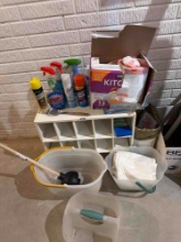 Assorted Cleaning Supplies and Plastic Tubs