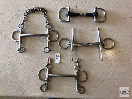 Four assorted horse bits