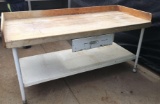Metal workbench with wooden top