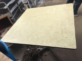 A 36 x 36 table with metal base