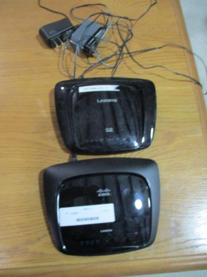 (2) Cisco Linksys Wireless Routers.