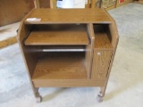 Wooden Rolling Computer Desk.