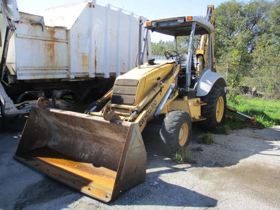 1998 New Holland Loader/Backhoe. 555E.